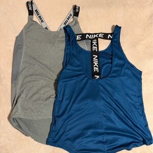 Two Nike Women's Racerback Tank Tops